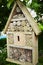 Insect hotel house shaped wooden garden frame