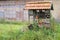 Insect shelter and nesting aid with various materials in a wooden frame under a roof, help for wild bees, pollen flies and many