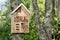 Insects box Wooden insect hotel or house on tree