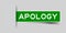 Inserted green label sticker with word apology on gray background