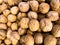 Inshell walnuts. Background made of nuts. Photowall-paper