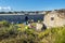 The inside area of the Fort in Hoedic island with the tents in he yard. The village buildings are at background. Brittany, France