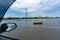 Inside Car view : pick up truck driving through flooded highway with a boat on road