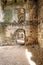 Inside the castle ruins room with stone walls