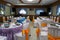 Inside the dining room, decorated with beautiful tables and chairs in Asian style.