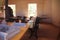 Inside the Fruita Schoolhouse with traditional desks and benches