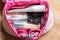 The inside of a girl\'s cosmetic bag