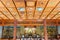 Inside Indosan Nippon Japanese Temple, Lord Buddha statue in the center with wall painted and wooden ceiling at Bodh Gaya.