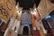 Inside interior of Carpet shop with colourful moroccan rugs and berber carpets on display in a souk market in the centre of medina