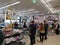 Inside a Lidl supermarket - people are waiting at the cash register