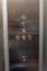 Inside of a lift, buttons with numbers for choosing floor options in a lift