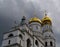 Inside the Moscow Kremlin. The bell tower of Ivan the Great against the background of thunderclouds.