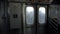Inside NYC Subway car, view of door and disabled seating section