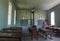 Inside One Room Schoolhouse Desks and Wood Stove