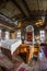 Inside of one small Orthodox Synagogue with lots of books in the