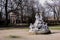 Inside the Parco Ducale of Parma: an iconic temple surrounded by lush greenery, adorned with statues and columns.