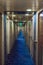 Inside Passage, BC, Canada - September 13, 2018: Long interior hallway to rooms aboard cruise ship.
