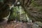 Inside the Stone church in Thurmansbang - Old church built in a stone cave between erratic rocks and large stones