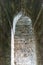 The inside view of the corridor of the Balo Kaley double dome stupa built in the 2nd century