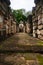 An inside view of the gallery of the ancient Khmer temple built of red sandstone and laterite and dedicated to the Hindu god Shiva