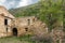 Inside view of an old monastery, made of stone and without a roof.