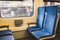 Inside The Wagon Train Germany, Dusseldorf. Empty train interior. interior view of corridor inside passenger trains with blue