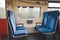 Inside The Wagon Train Germany, Dusseldorf. Empty train interior. interior view of corridor inside passenger trains with blue