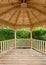 Inside of wooden gazebo under construction.