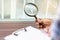 Inspection checklist review material property. Consultant house inspector holding Magnifying glass check material of property.