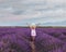 Inspiration and creativity concept, woman in inspiring landscape of lavender blooming field
