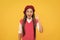 inspiration. tween and youth. yes. casual fashion. happy french teen girl on yellow background