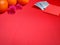 inspirational chinese new year concept image of red envelope,money,oranges and flowers in red colour background