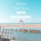 Inspirational and motivational quote. Each day is a new beginning. Background with serenity landscape with beach and sky