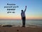 Inspirational motivational quote - Promise yourself you will never give up. With blurry background of young man standing beach