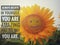 Inspirational quote - Always believe in yourself, you are amazing just the way you are. With beautiful smiling face of  sunflower
