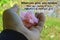 Inspirational quote - When you give, your receive. With woman holding pink flower in hand.