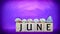 inspirational time concept - word june on wooden blocks with seashells in purple vintage background