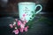 Inspirational words - Be a better you, for you. Self care and love motivational quote written on a coffee cup with pink roses plan
