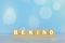 Inspirational words on wooden blocks - Be kind. On vintage soft blue bokeh background. Kindness motivational quote concept