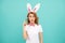 inspired with idea easter woman with bunny ears on blue background