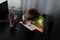 Inspiring Home Study: Boy Engaged in Homework with Laptop and Colorful Pens