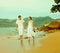Instagram colorized vintage couple on beach portrait