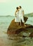 Instagram colorized vintage couple on beach portrait