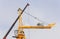 Installation of a construction crane before starting construction. Construction crane assembly stage