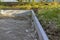 Installation of curbs. laying curb stones using concrete. Selective focus