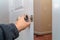 Installation locked interior door woodworker hands install lock