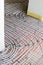 Installation of underfloor heating pipes for water heating. Heating systems. Pipes for underfloor heating