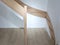 A installation of a wooden staircase in the house