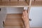 Installing a child-proof magnetic lock to protect cabinet doors and drawers of home furniture