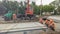 Installing concrete plates by crane at road construction site timelapse hyperlapse.